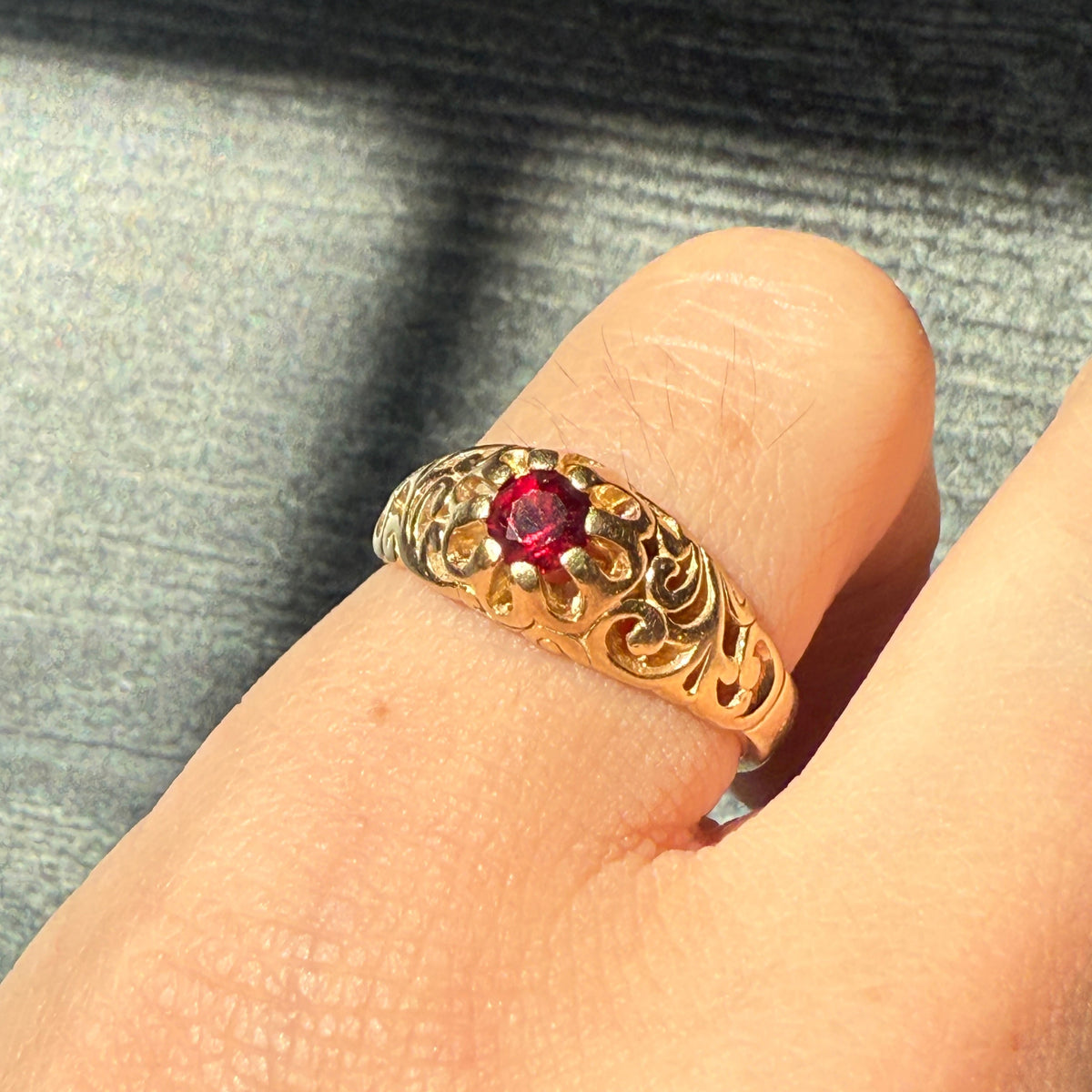 Garnet Ring with Scrolled Shoulders in 14K Gold