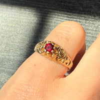 Garnet Ring with Scrolled Shoulders in 14K Gold