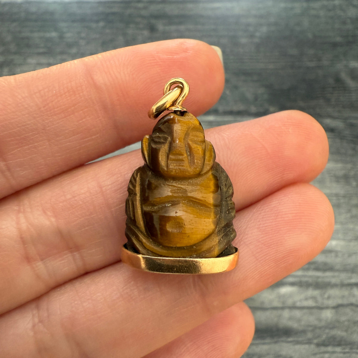 Carved Tiger Eye and 18K Gold Buddha Pendant