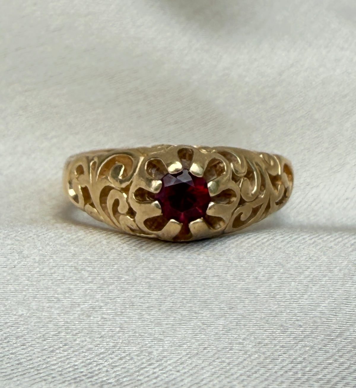 Garnet Ring with Scrolled Shoulders in 14K Gold