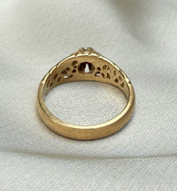 Garnet Ring with Scrolled Shoulders in 14K Gold