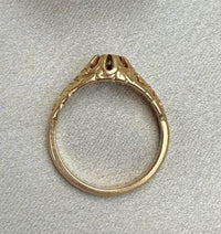 Garnet Ring with Scrolled Shoulders in 14K Gold