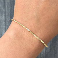 Diamond and 14K Yellow Gold Twist Bangle