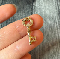 Ornate 10K Gold Skeleton Key Charm