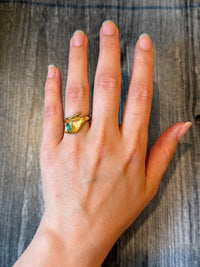 Figural Ring of Hand Holding an Emerald in 18K Gold(I)