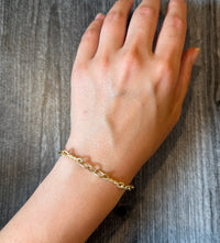 Interlocking Oval and Twist Bar Link Bracelet in 18K Gold (M)