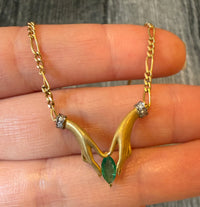 Two Hands Holding an Emerald Necklace in 18K Gold with Diamond Cuffs (I)