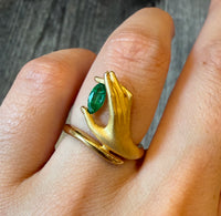 Figural Ring of Hand Holding an Emerald in 18K Gold (I)
