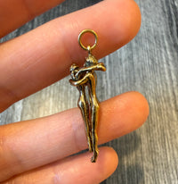 Vintage 14K Gold Charm of a Man and Woman Embracing