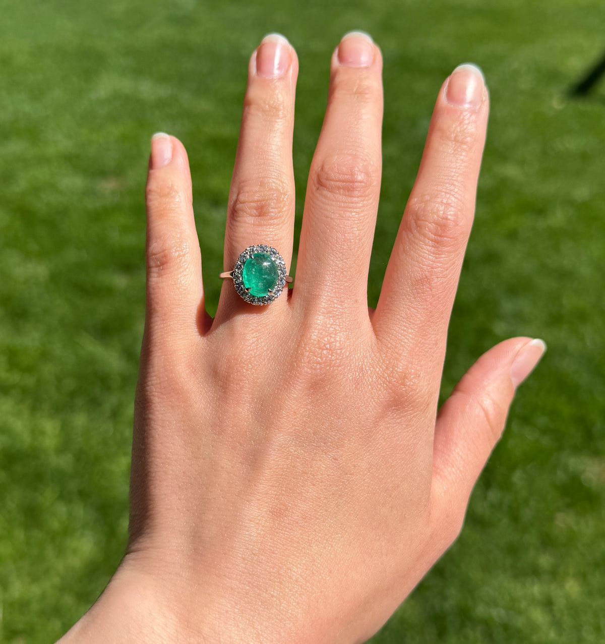 3.3 Carat Cabochon Emerald and Diamond Halo Ring