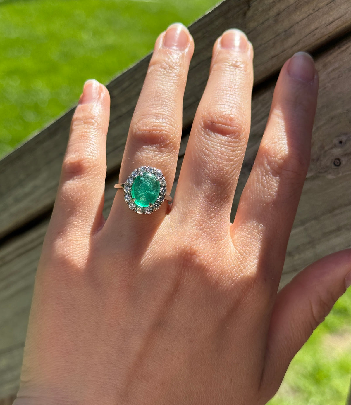 3.3 Carat Cabochon Emerald and Diamond Halo Ring