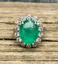 3.3 Carat Cabochon Emerald and Diamond Halo Ring