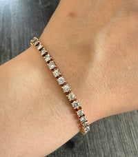 Diamond and 14K Gold Tennis Bracelet, 5.28 Carats