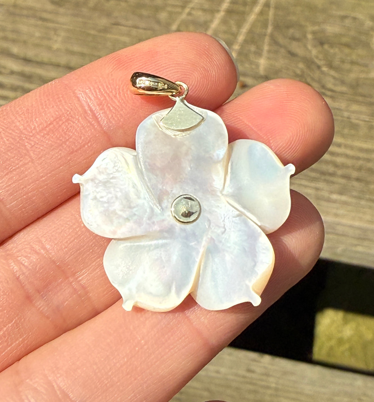 Carved Mother of Pearl Flower Pendant with Emeralds