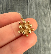 Abstract 14K Gold Atomic Star Charm