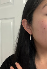 Bezel Set Triple Diamond Dangle Earrings in 14K Gold