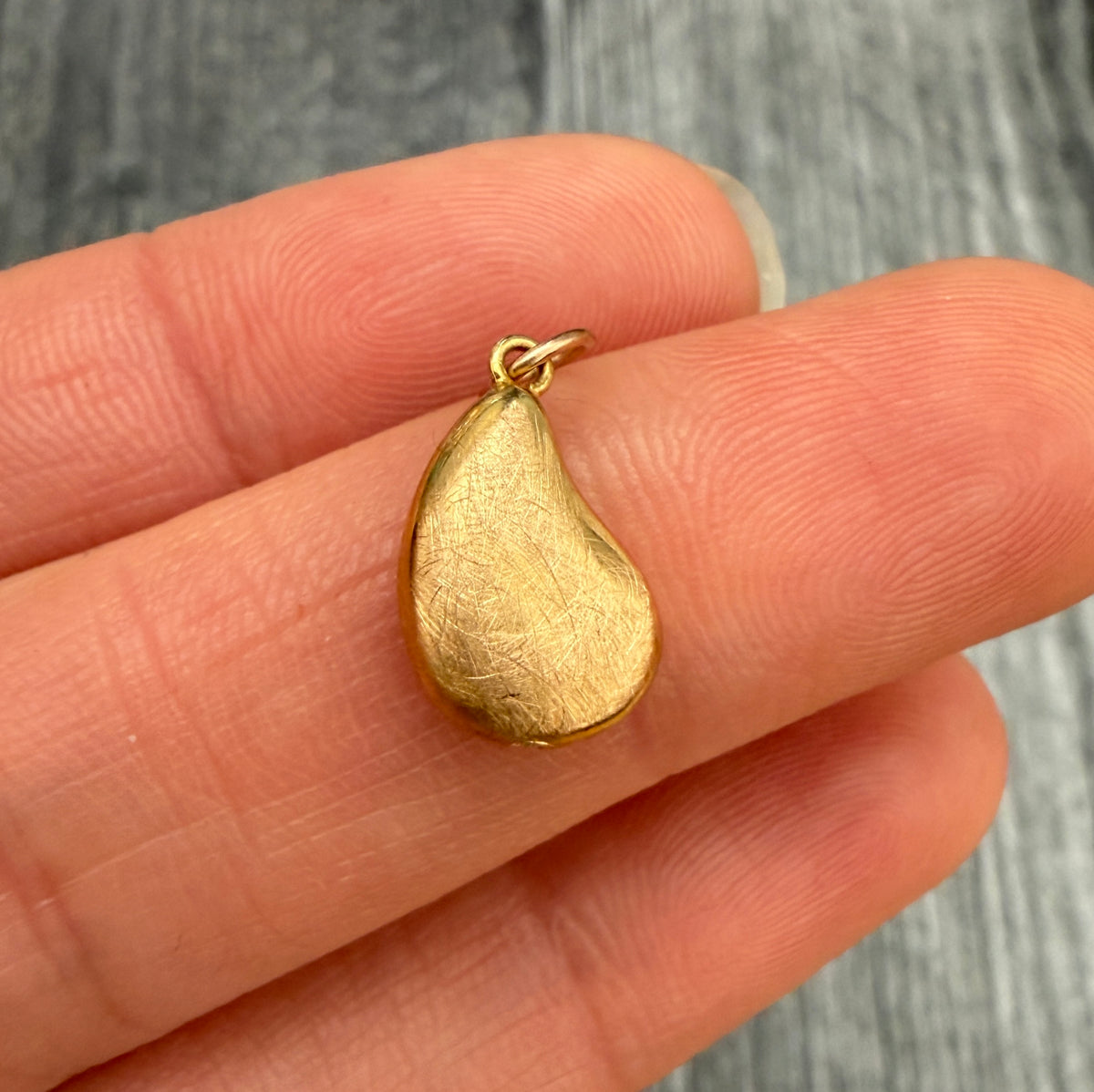 14K Gold Bean Shaped Charm
