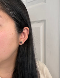 Cabochon Amethyst and Swirled Border Stud Earrings In 14K Gold