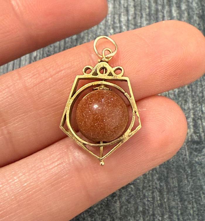 Antique Goldstone and 14K Gold Spinner Charm