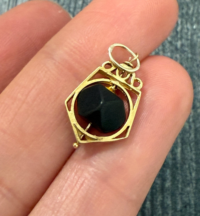 Antique Ebony and 14K Gold Spinner Charm