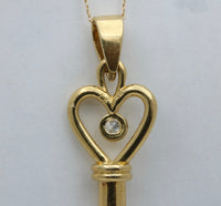 Large Diamond and 18K Gold LOVE Skeleton Key Pendant