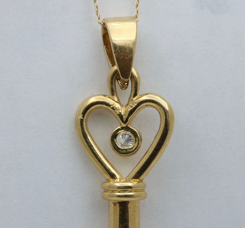 Large Diamond and 18K Gold LOVE Skeleton Key Pendant