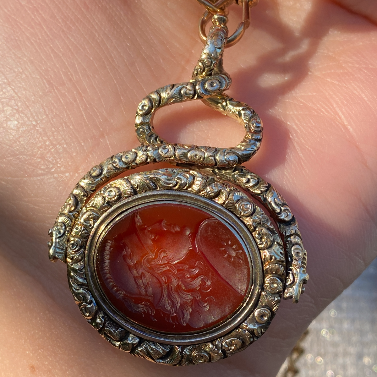 Large Early Victorian Heavily Chased 14K Gold and Carnelian Intaglio Spinner Pendant