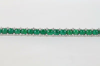 Vibrant 28 Carat Cabochon Emerald and 2.3 Carat Diamond 18K Gold Bracelet - alpha-omega-jewelry