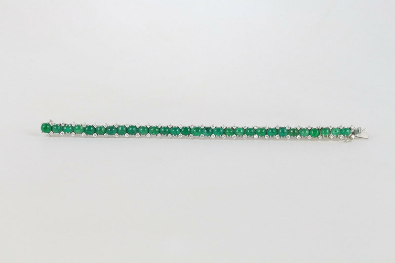 Vibrant 28 Carat Cabochon Emerald and 2.3 Carat Diamond 18K Gold Bracelet - alpha-omega-jewelry