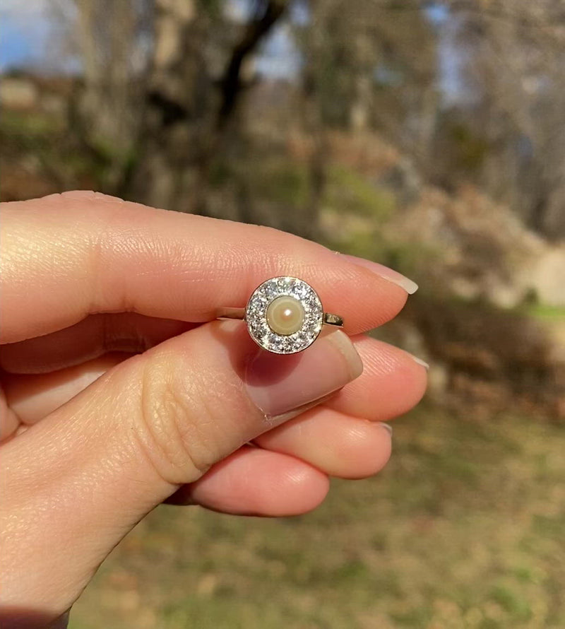 Art Deco Platinum and 14K Gold Pearl and Diamond Halo Ring Alpha Omega Jewelry