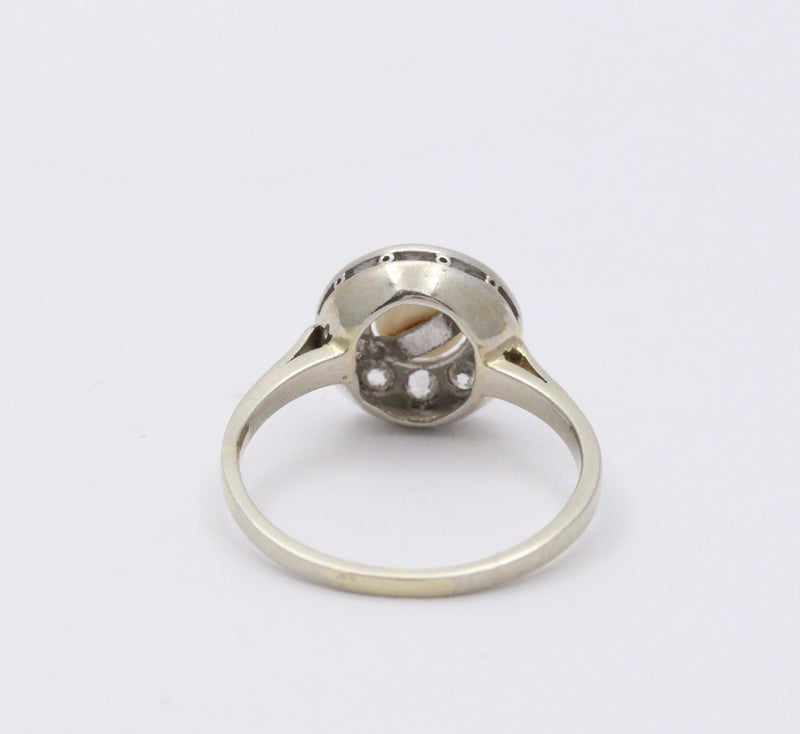 Art Deco Platinum and 14K Gold Pearl and Diamond Halo Ring
