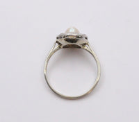 Art Deco Platinum and 14K Gold Pearl and Diamond Halo Ring