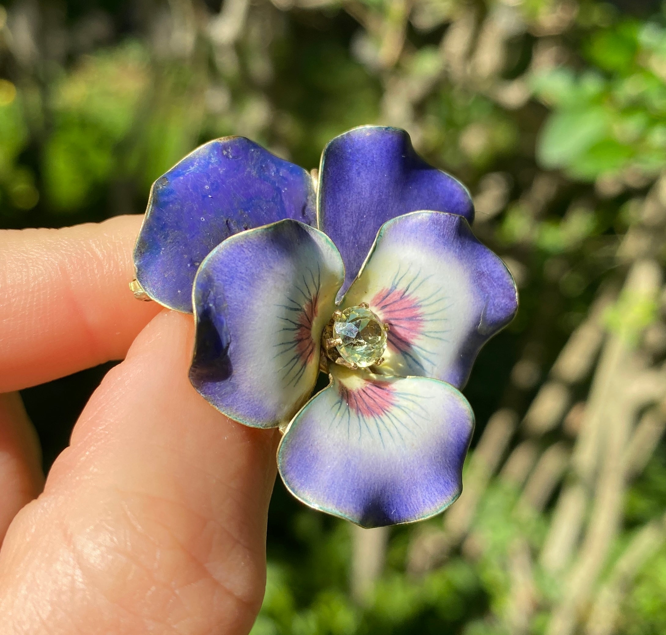 Lot - JEWELRY: Two 14K Gold Pins: a yellow gold Art Nouveau pansy pin,  purple enameled pansy with one old European cut diamond in center,  (approximately 0.03 ct). 7/8 x 5/8, diamond