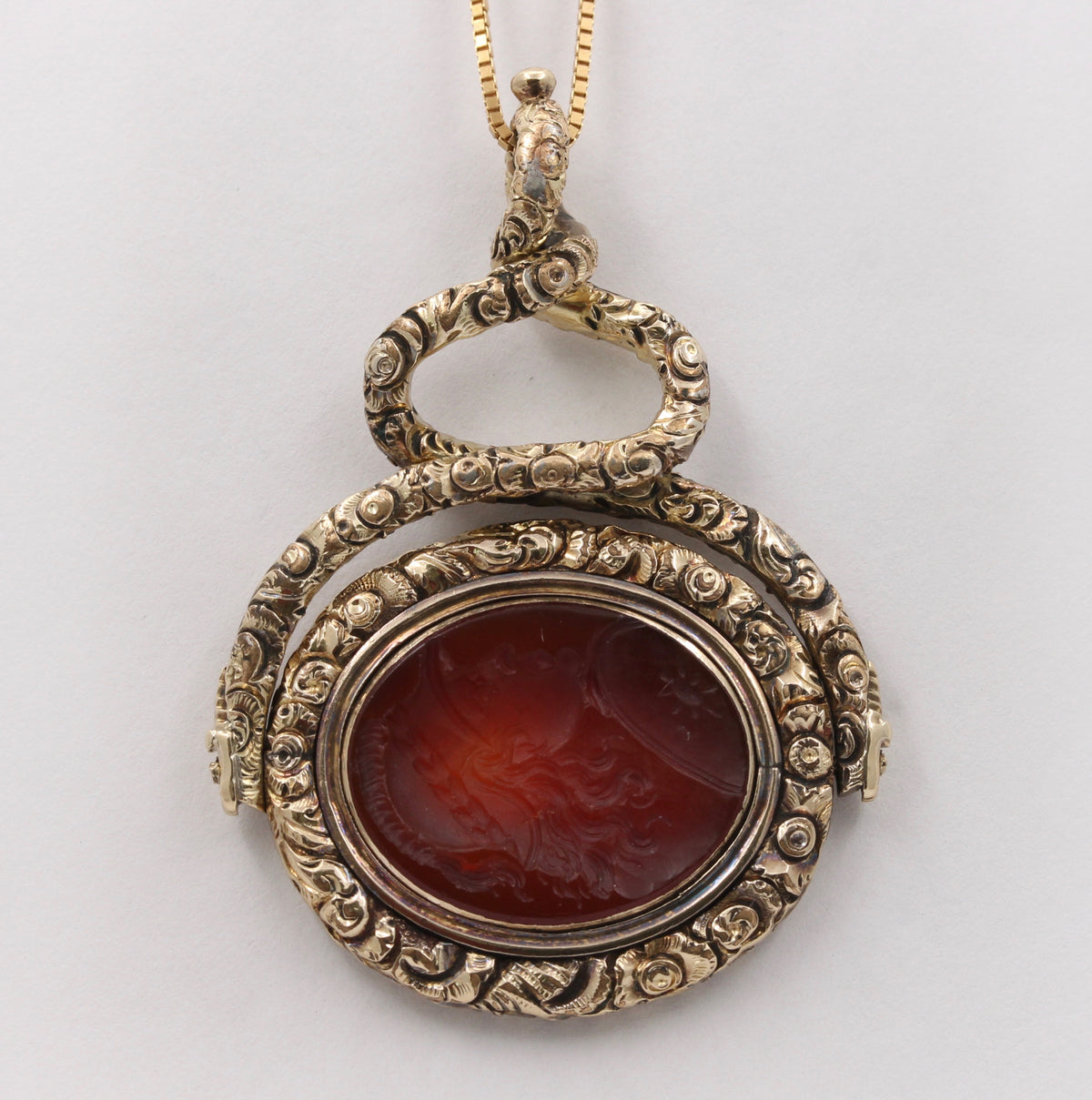 Large Early Victorian Heavily Chased 14K Gold and Carnelian Intaglio Spinner Pendant