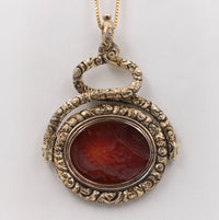 Large Early Victorian Heavily Chased 14K Gold and Carnelian Intaglio Spinner Pendant