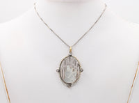 Art Deco Platinum 18K Gold, Diamond, Mother-of-Pearl Mother and Child Pendant, Necklace