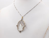Art Deco Platinum 18K Gold, Diamond, Mother-of-Pearl Mother and Child Pendant, Necklace