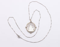 Art Deco Platinum 18K Gold, Diamond, Mother-of-Pearl Mother and Child Pendant, Necklace