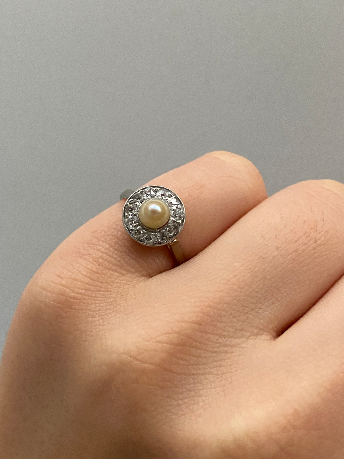 Art Deco Platinum and 14K Gold Pearl and Diamond Halo Ring
