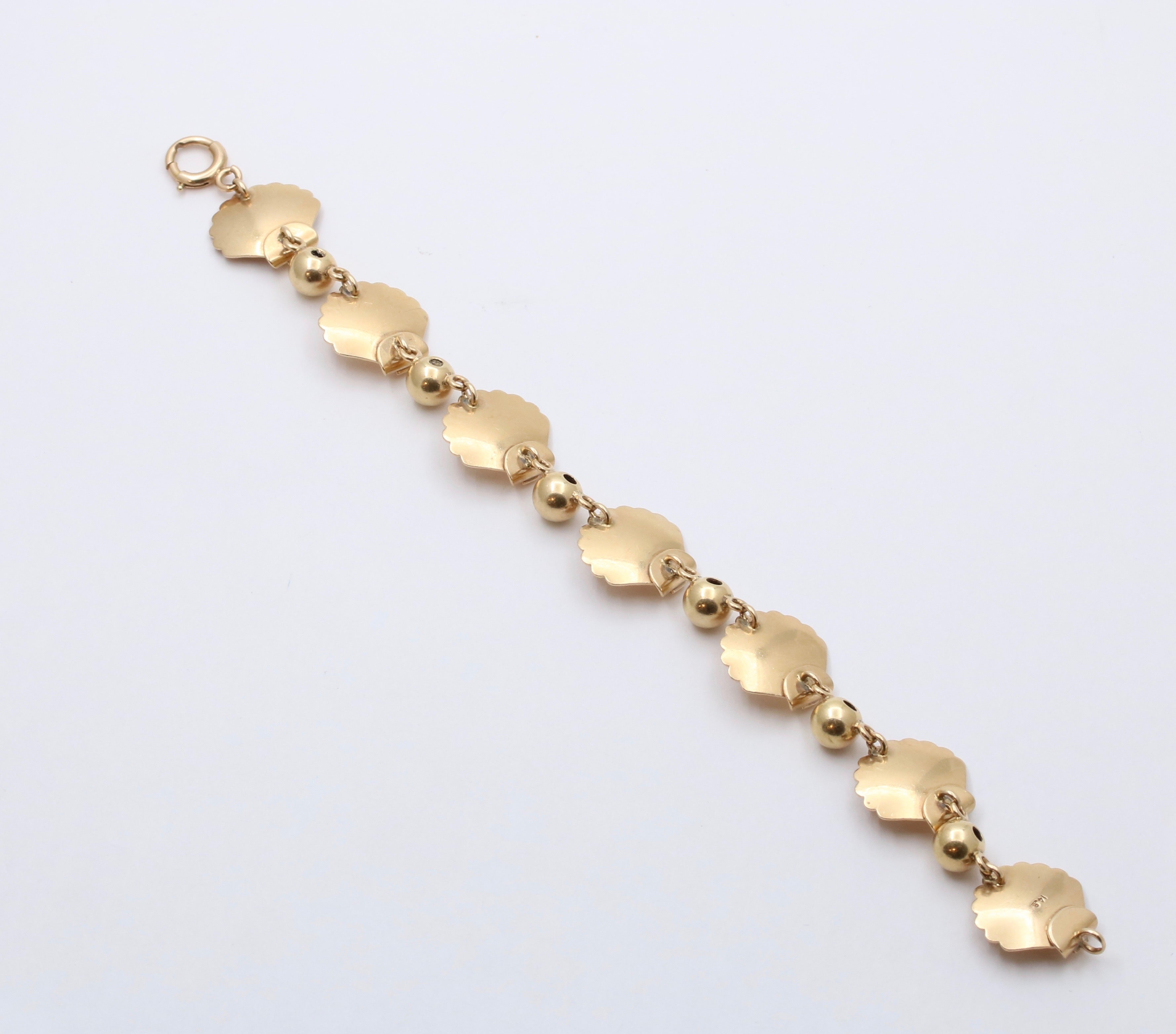 Gold online shell bracelet