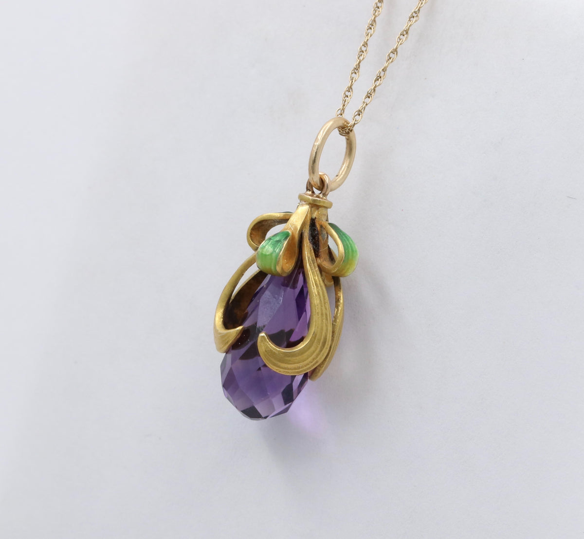 Art Nouveau Amethyst Briolette, Enamel, and 14K Gold Swirl Charm