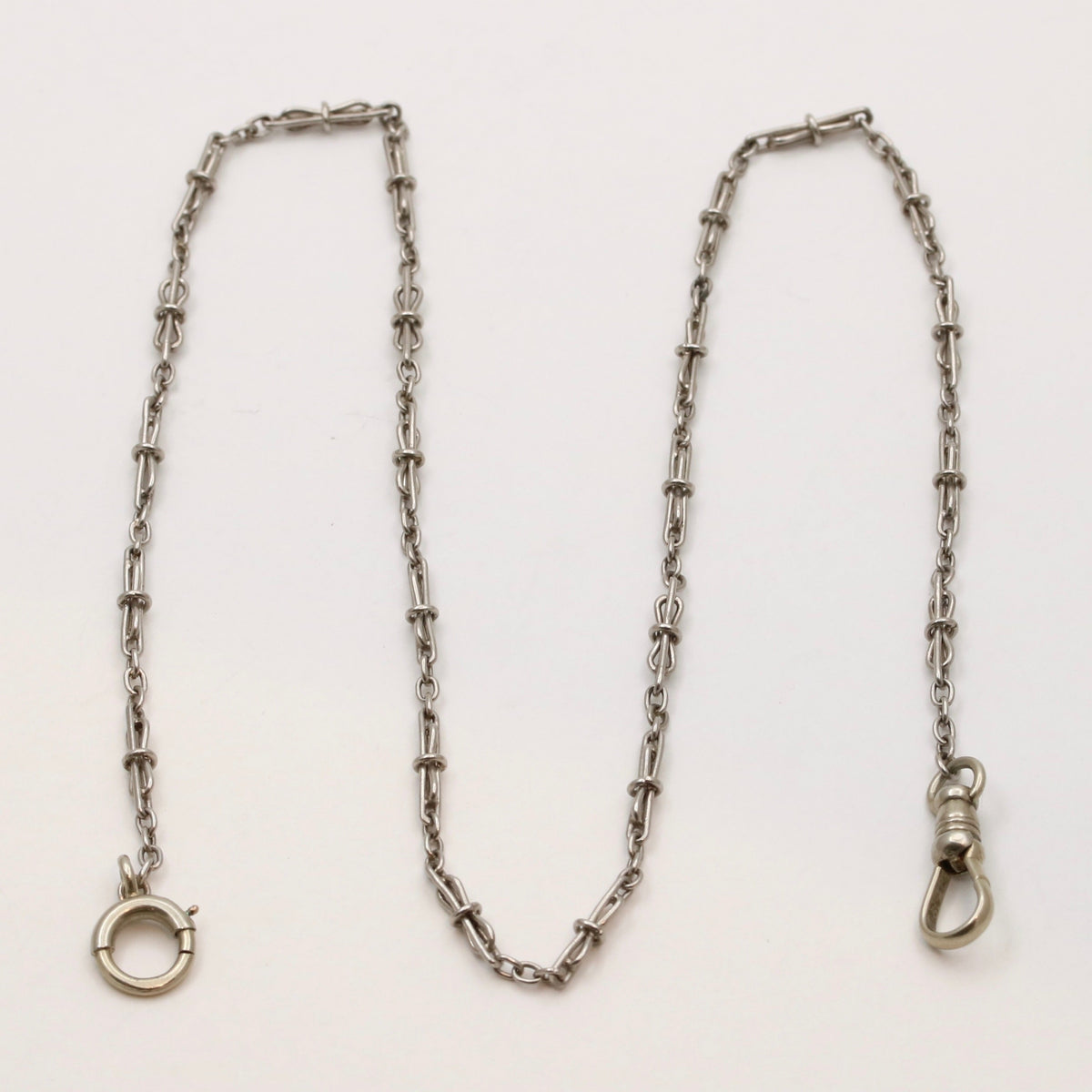 Art Deco Platinum Hourglass Shaped 14.75” Long Open Link Watch Chain