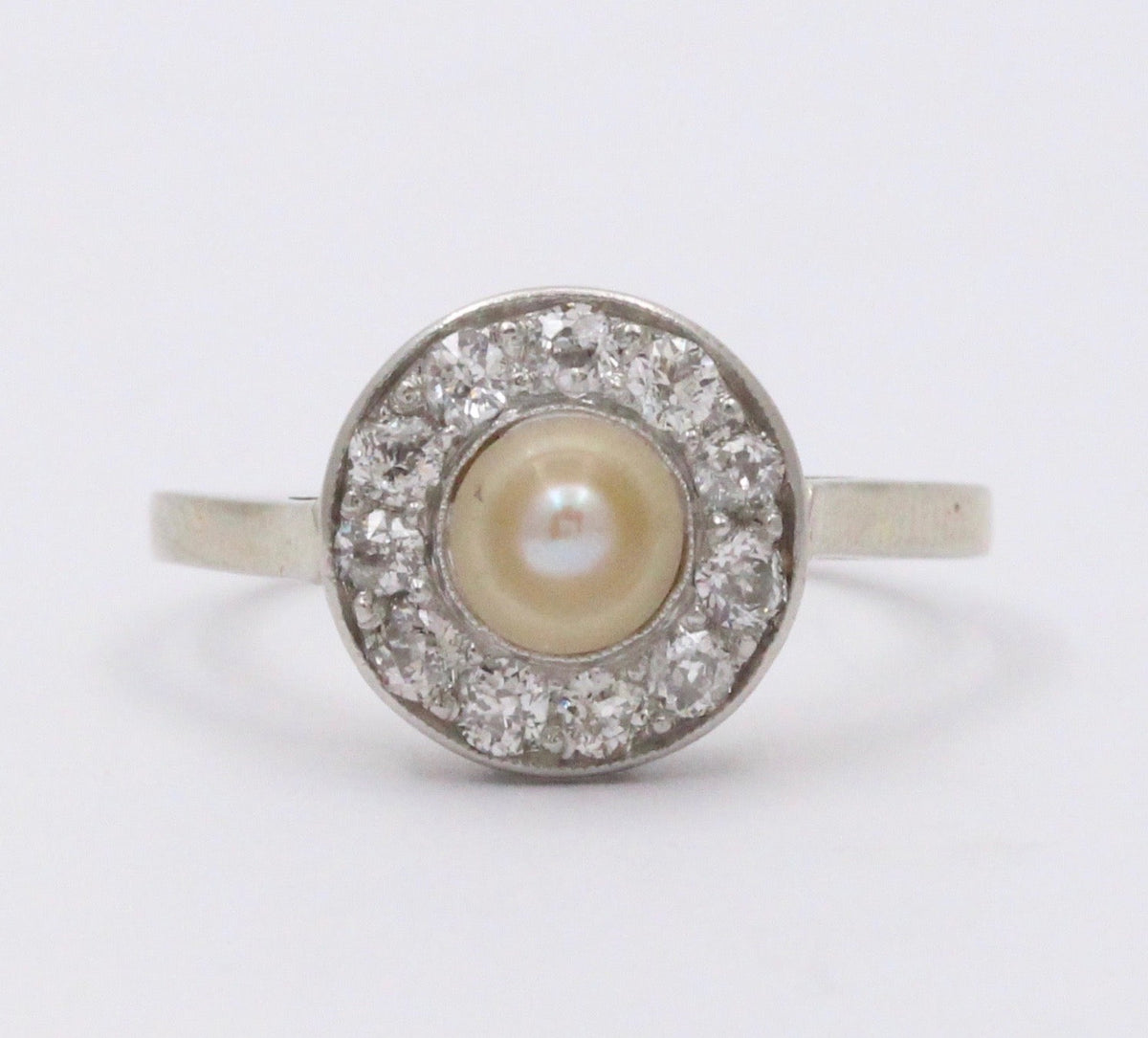 Art Deco Platinum and 14K Gold Pearl and Diamond Halo Ring