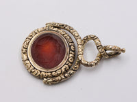 Large Early Victorian Heavily Chased 14K Gold and Carnelian Intaglio Spinner Pendant